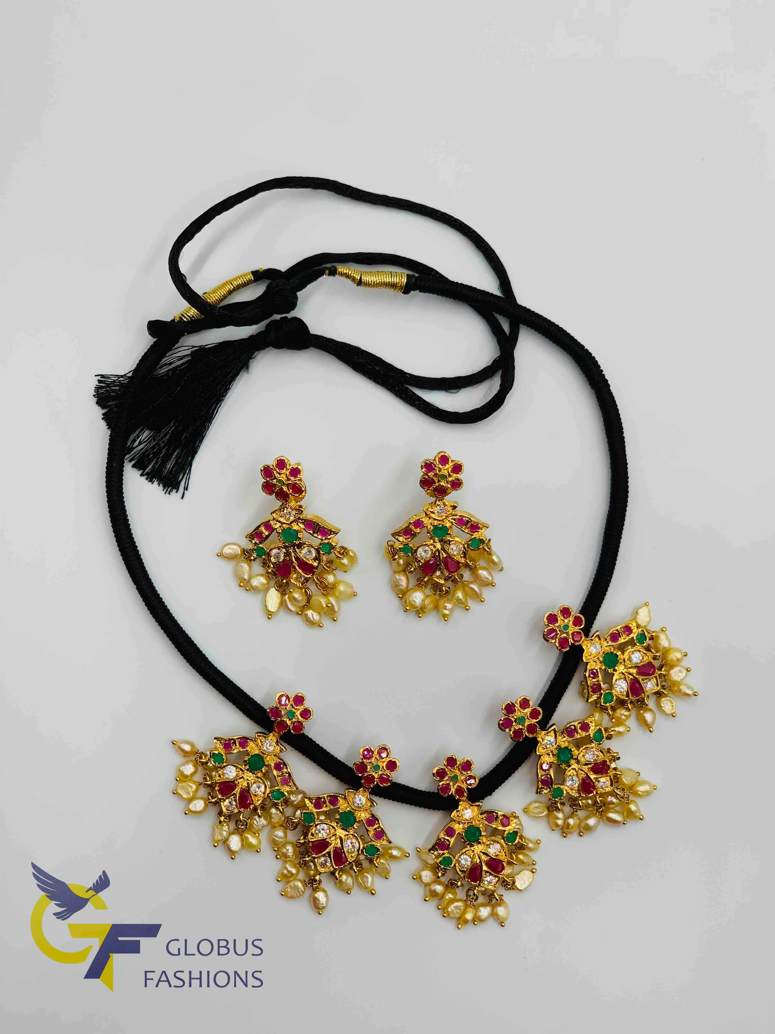 Beautiful multicolor stones and pearls with black thread