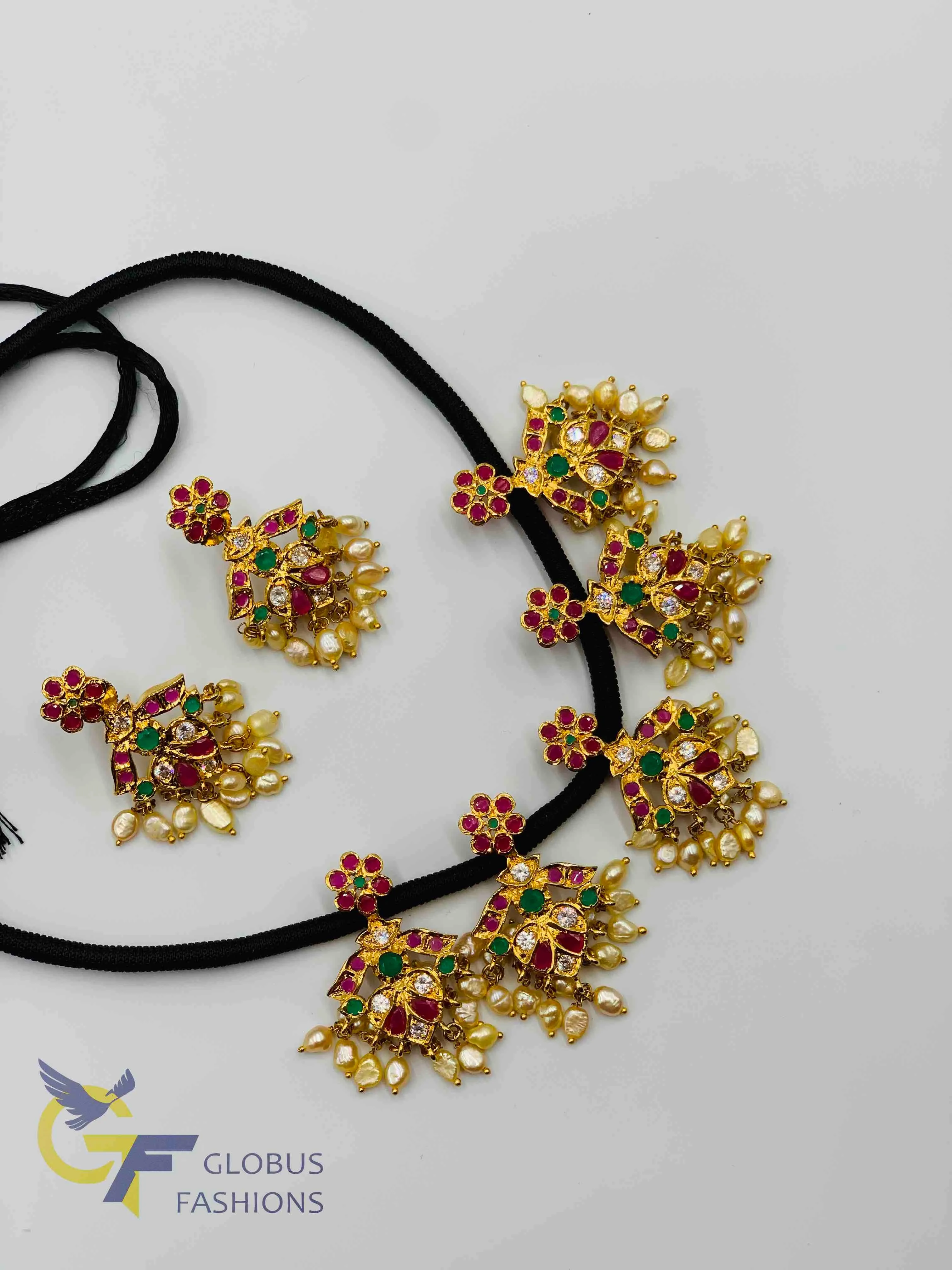 Beautiful multicolor stones and pearls with black thread