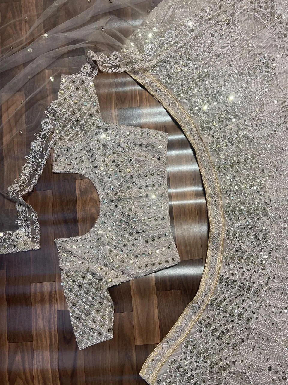 Biege Premium Net Embroidered Lehenga Choli