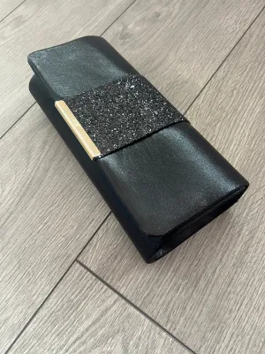 Black Clutch Bag With Glitter Strip