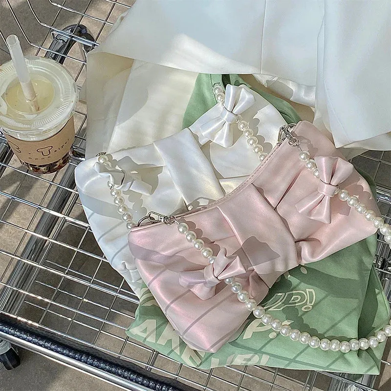 Elegant Satin Clutch with Exquisite Pearl Handle