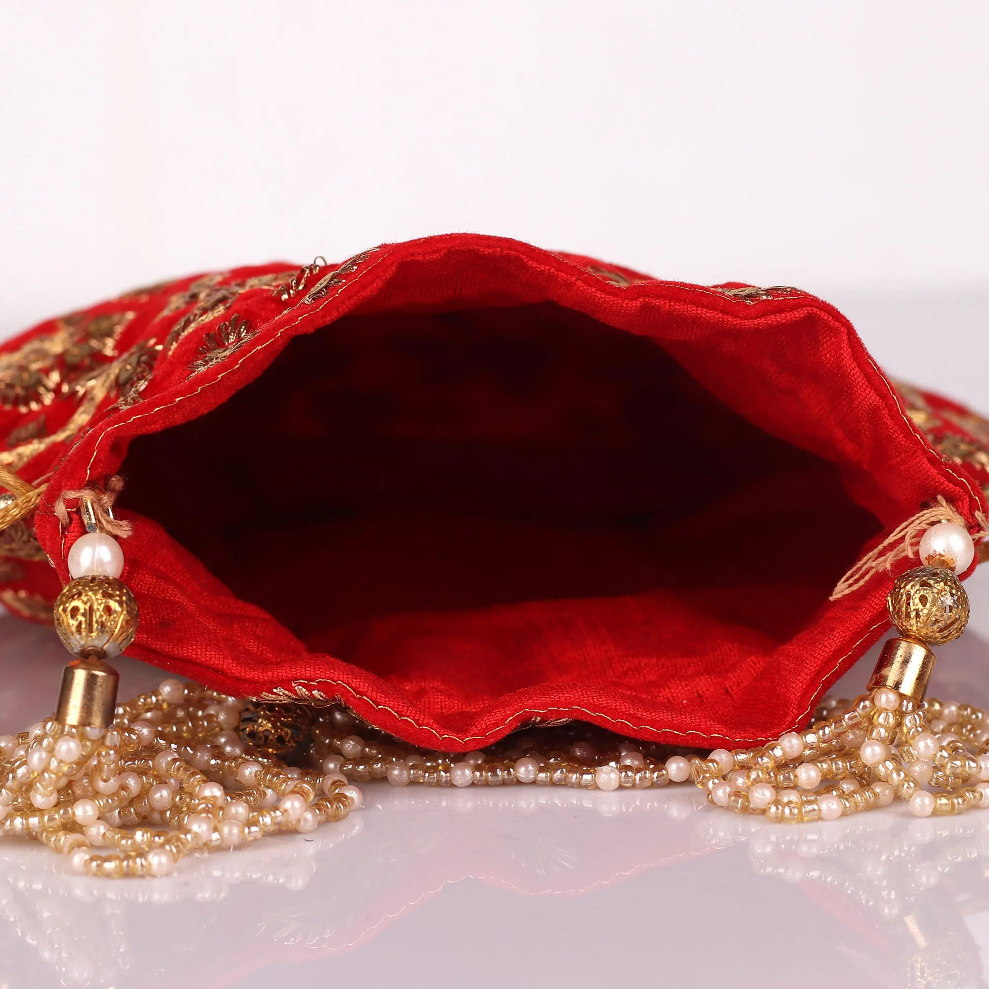 The Red Nazakat Potli